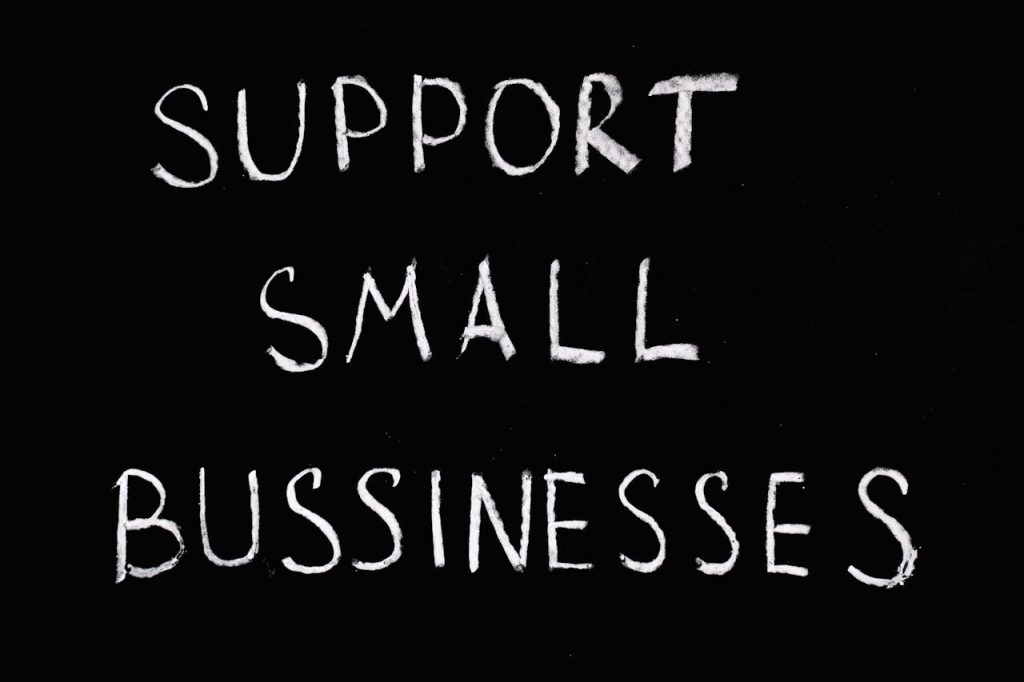 Support Small Businesses Lettering Text on Black Background